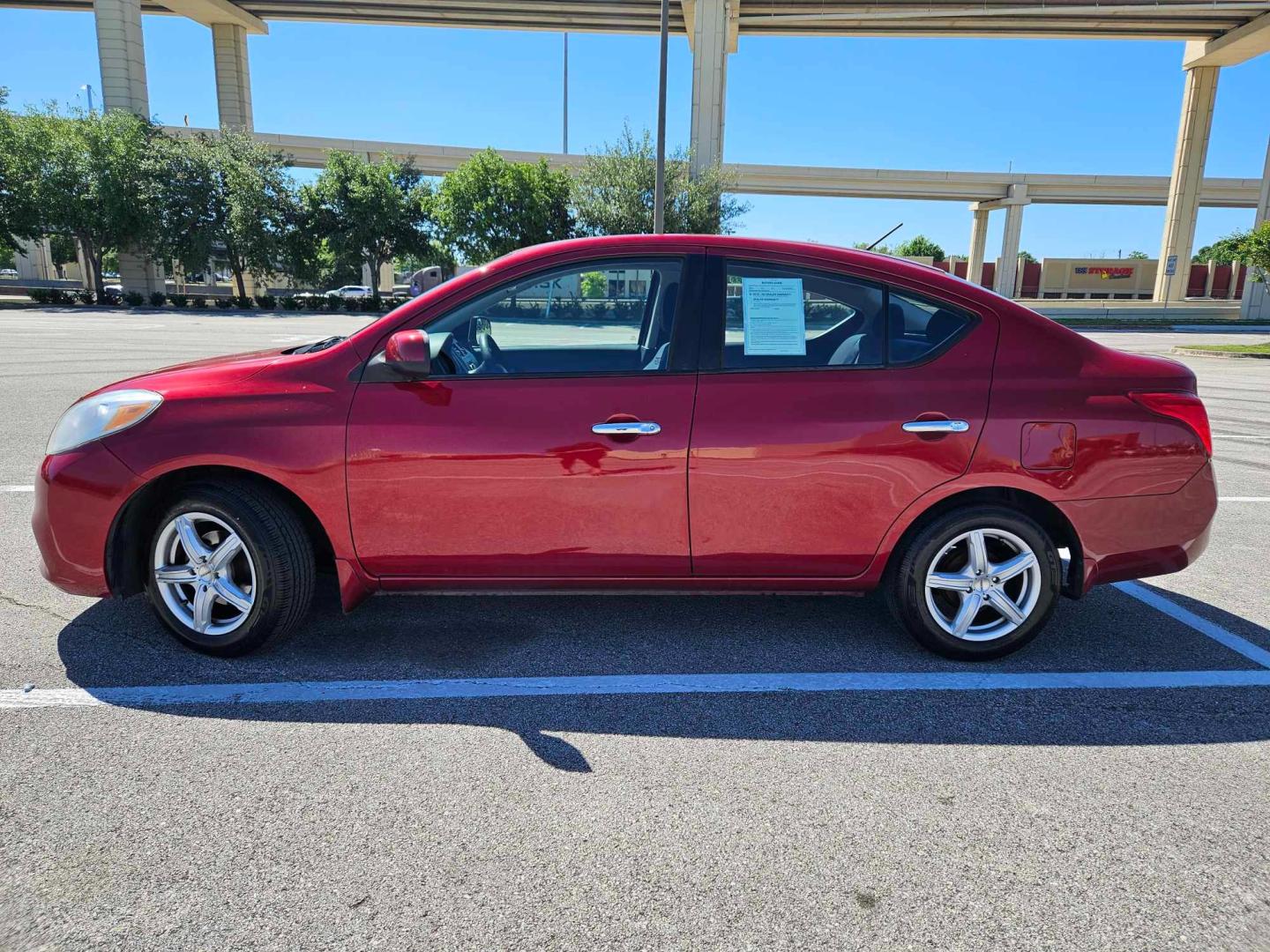 2012 Red /Black Nissan Versa (3N1CN7AP8CL) , located at 5005 Telephone Rd., Houston, TX, 77087, (713) 641-0980, 29.690666, -95.298683 - Photo#5